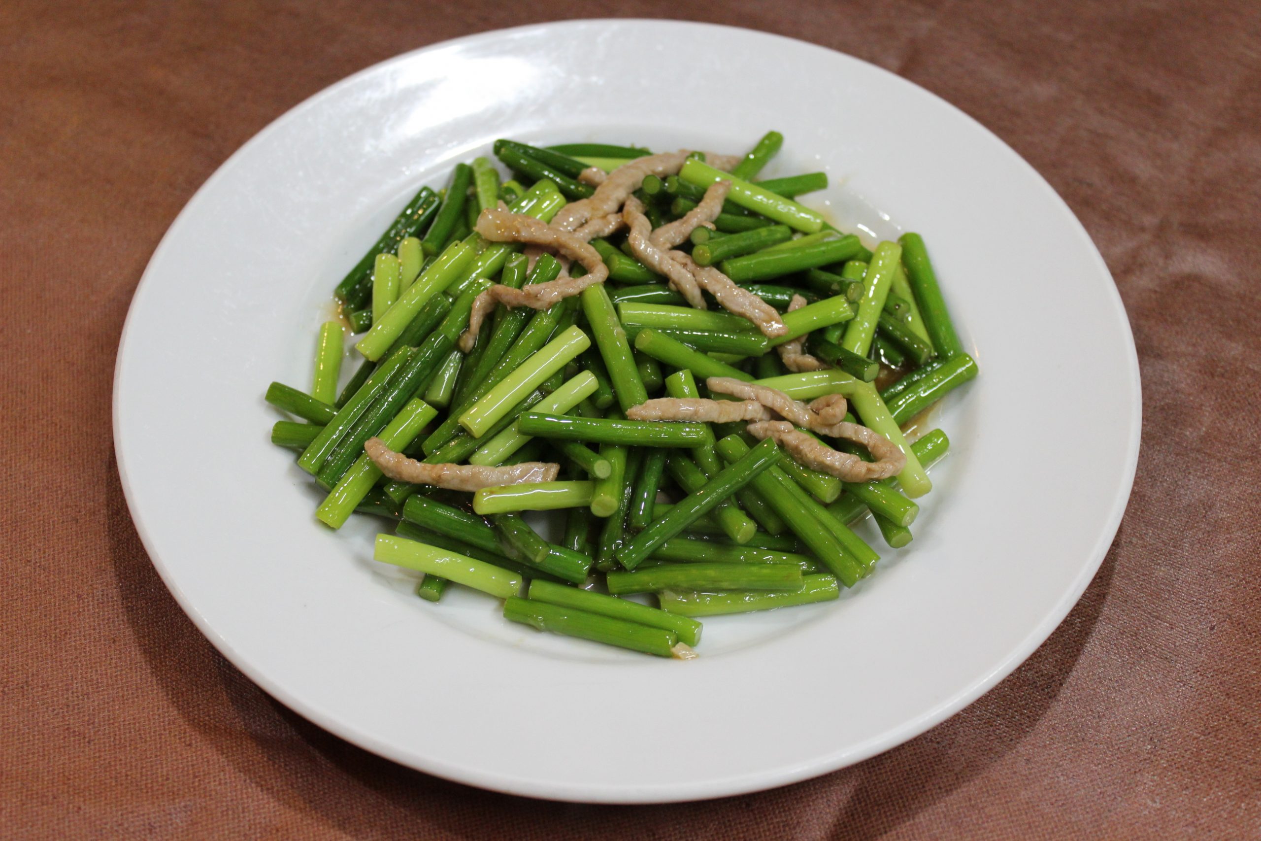 【炒蒜台】豚肉とニンニクの芽の炒め物